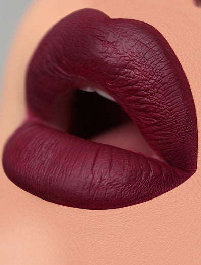 Mixture between deep purple and burgundy liquid lipstick